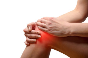 Osteoarthritis Treatment Baltimore, MD- woman holding hurt knee