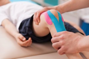 Baltimore Physical Therapy Clinics - therapist working on knee