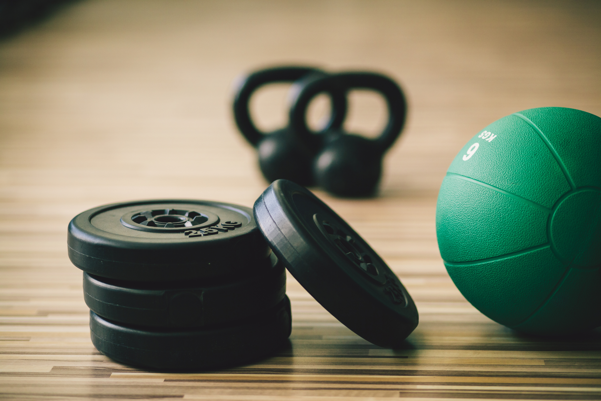 Sports Therapy Rosedale, MD - weights and medicine ball fitness background